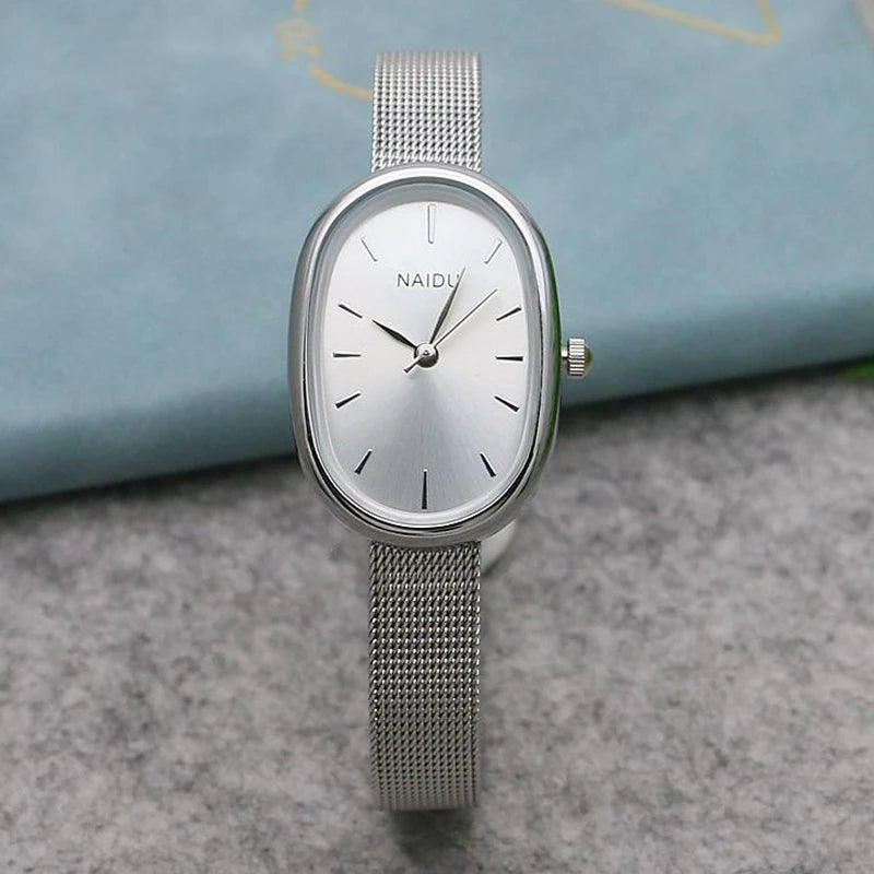 Women Quartz Watch Luxury Oval Shaped Fashion Mini Case Small Roman Numeral Dial Female Full Metal Band Watches Niche Wristwatch