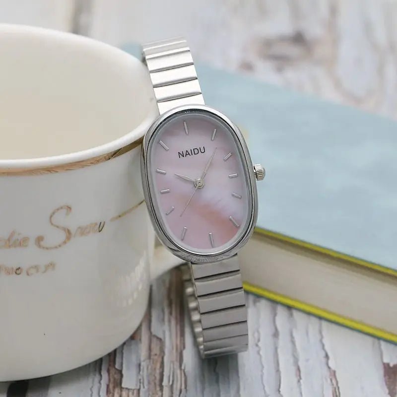 Women Quartz Watch Luxury Oval Shaped Fashion Mini Case Small Roman Numeral Dial Female Full Metal Band Watches Niche Wristwatch