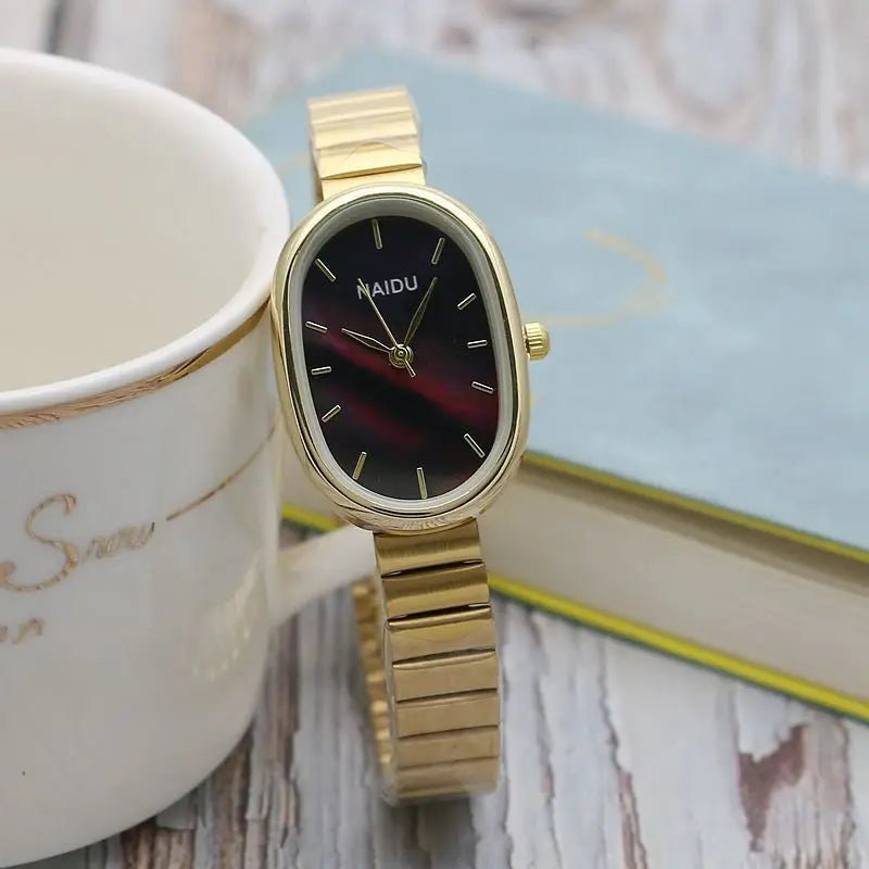 Women Quartz Watch Luxury Oval Shaped Fashion Mini Case Small Roman Numeral Dial Female Full Metal Band Watches Niche Wristwatch