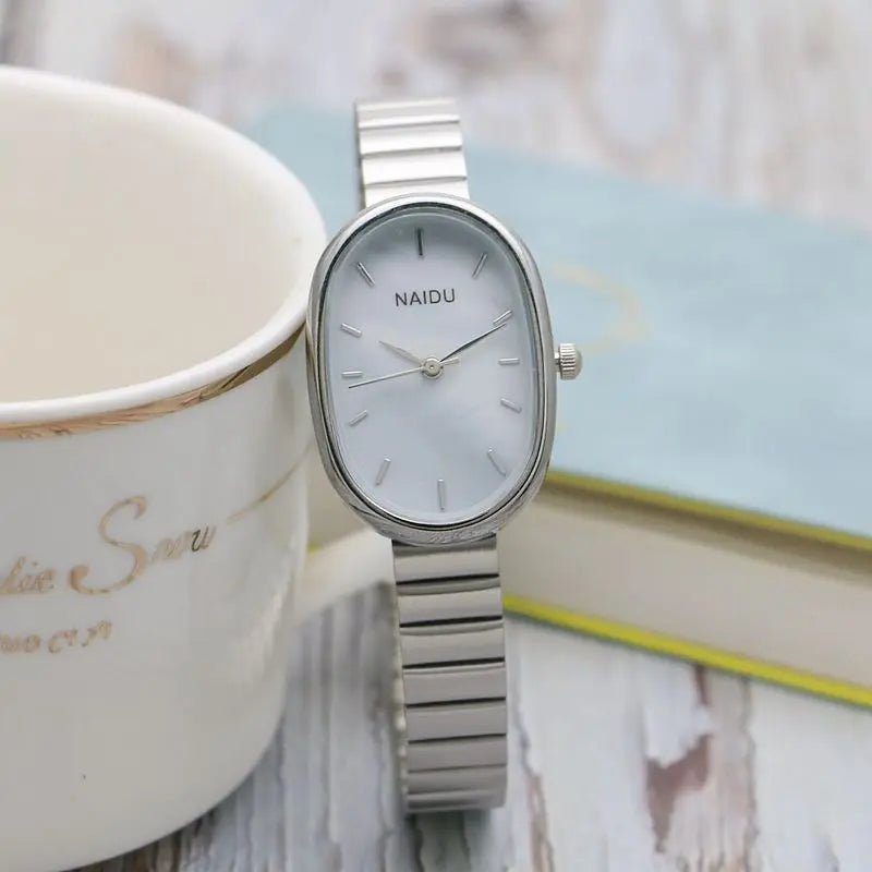 Women Quartz Watch Luxury Oval Shaped Fashion Mini Case Small Roman Numeral Dial Female Full Metal Band Watches Niche Wristwatch