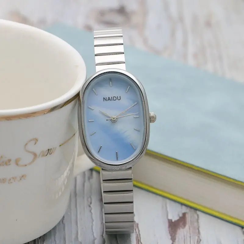 Women Quartz Watch Luxury Oval Shaped Fashion Mini Case Small Roman Numeral Dial Female Full Metal Band Watches Niche Wristwatch