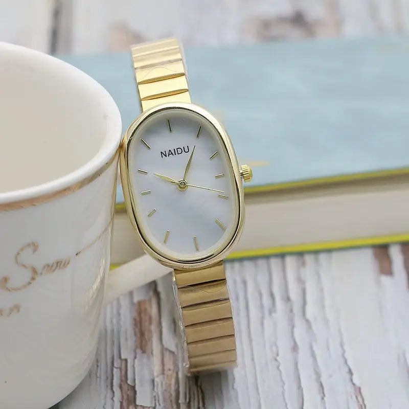 Women Quartz Watch Luxury Oval Shaped Fashion Mini Case Small Roman Numeral Dial Female Full Metal Band Watches Niche Wristwatch