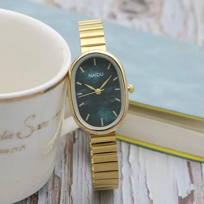 Women Quartz Watch Luxury Oval Shaped Fashion Mini Case Small Roman Numeral Dial Female Full Metal Band Watches Niche Wristwatch